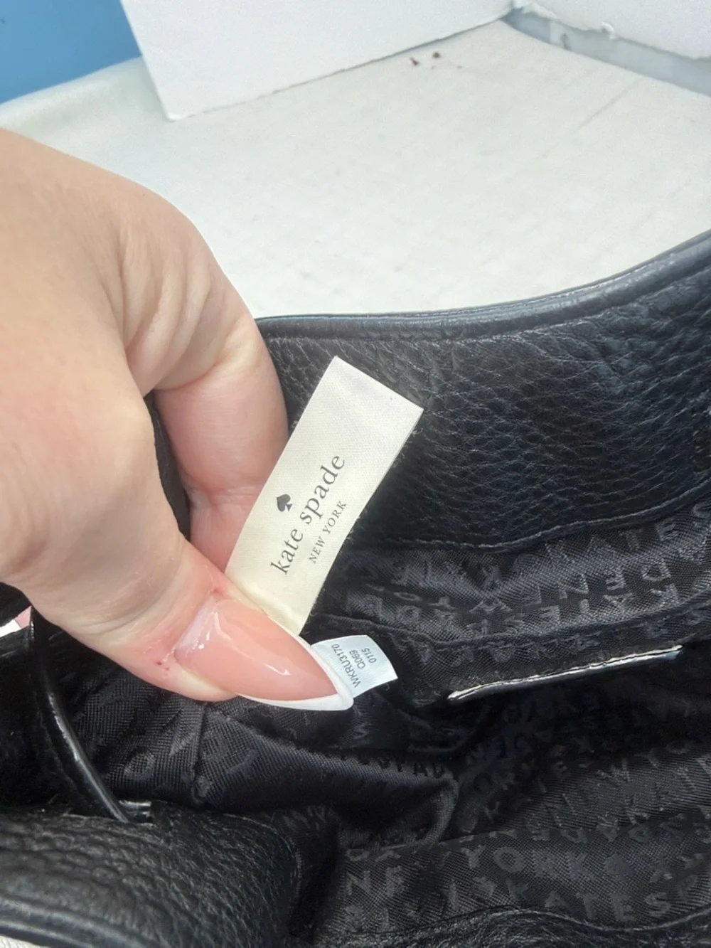 Kate Spade New York drawstring bucket bag, from the Grey Street  Tiny Cooper
